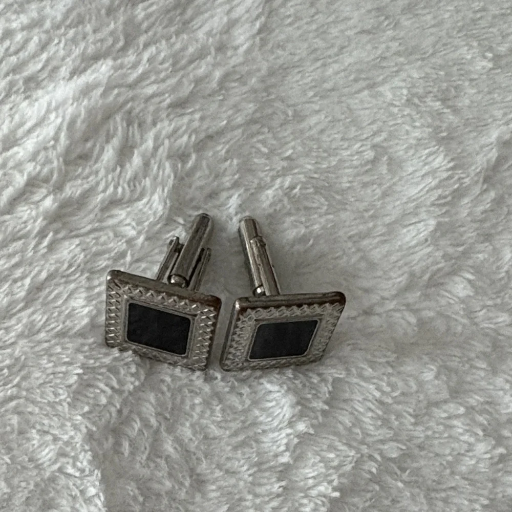 Elegant Silver and Black Cufflinks